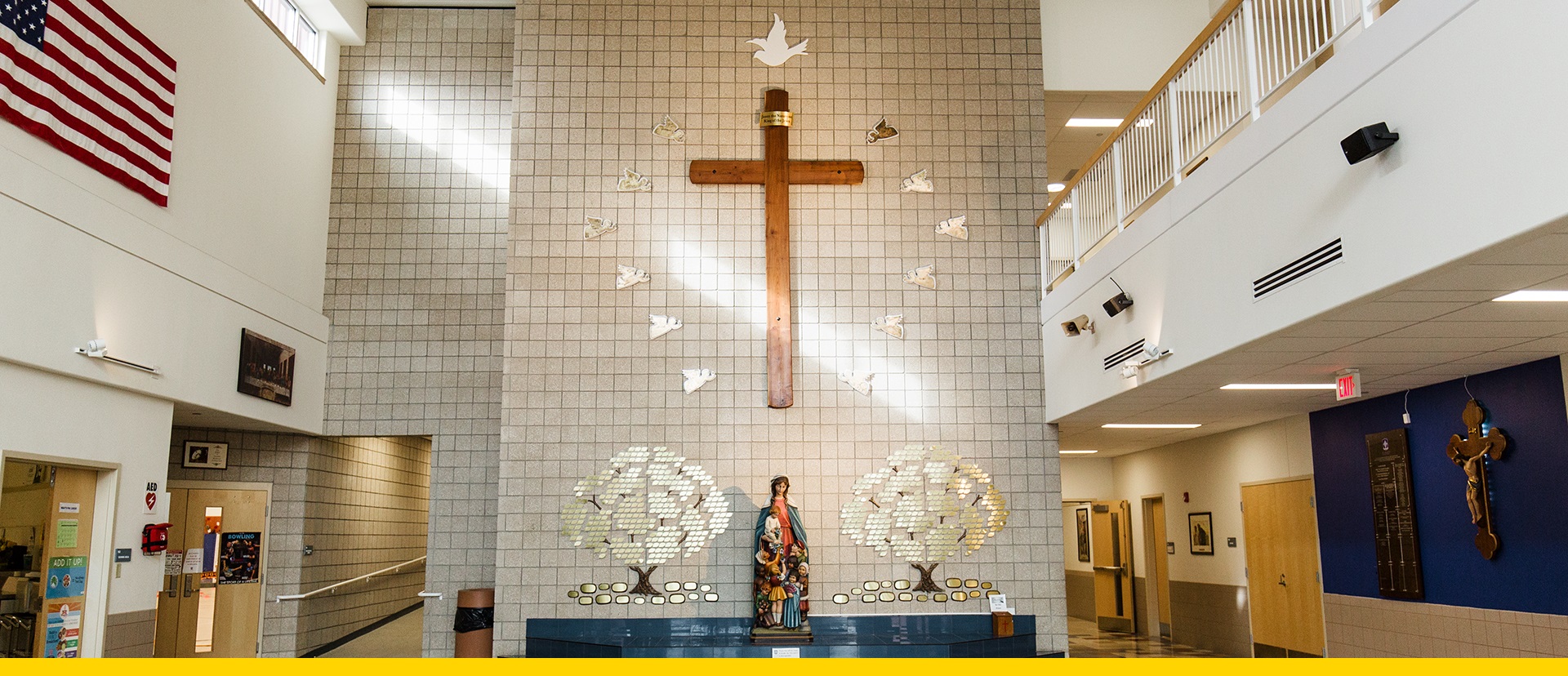 St. Mary's Catholic School entryway with a large wooden Cross in the center